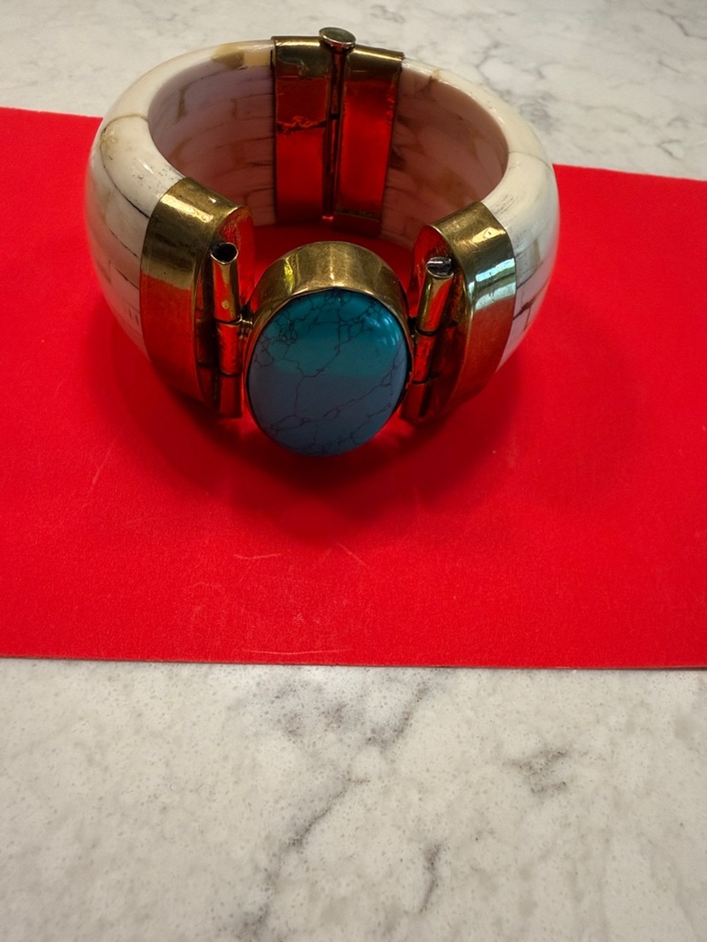 White Elephant Bone Bracelet with Turquoise Cabochon.